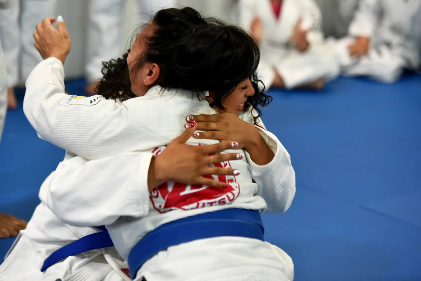 Adult Brazilian Jiu-Jitsu training on the mats